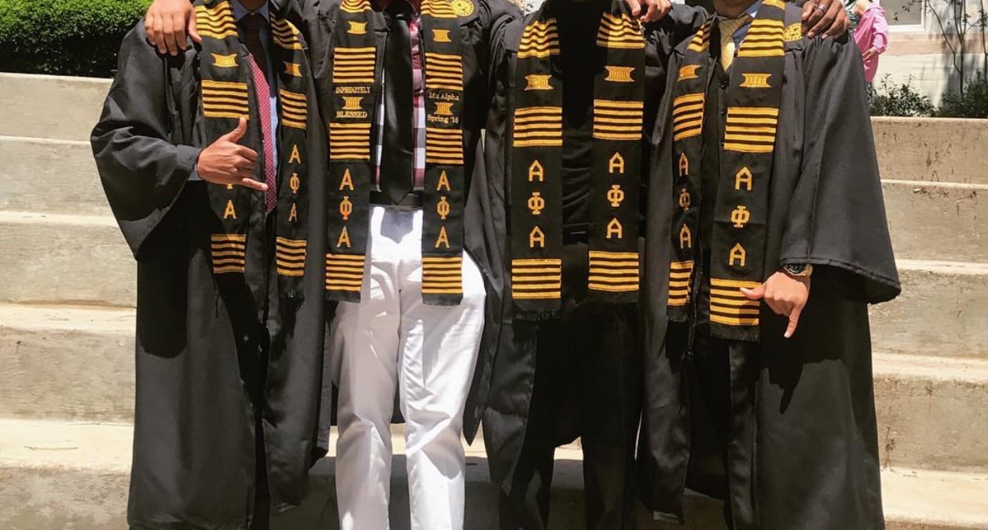 Alpha Phi Alpha fraternity members at a campus event