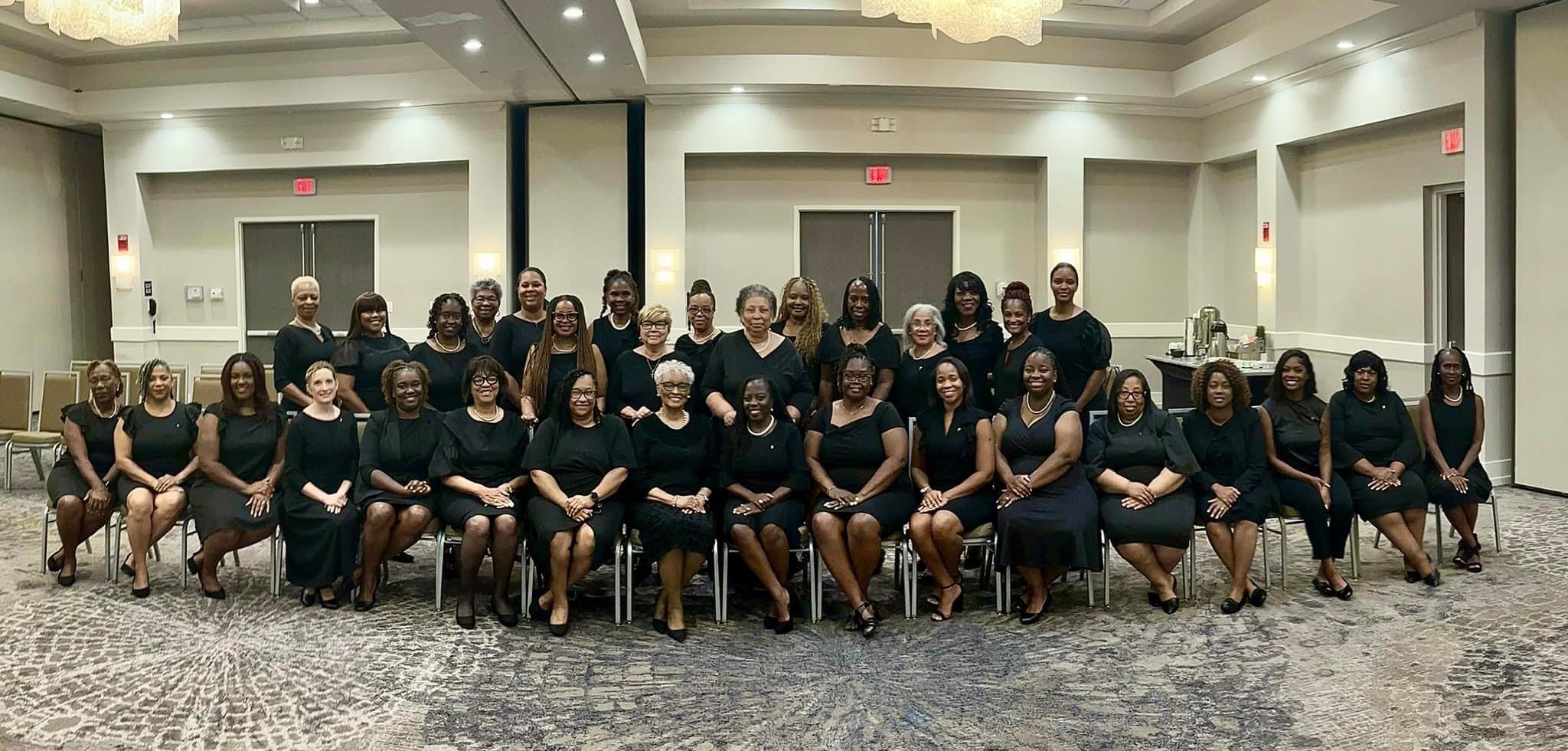 Nu Eta Eta chapter of Chi Eta Phi at a community event