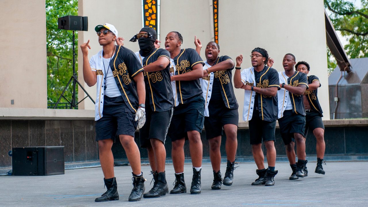 NPHC yard show with Divine Nine members performing for a campus crowd