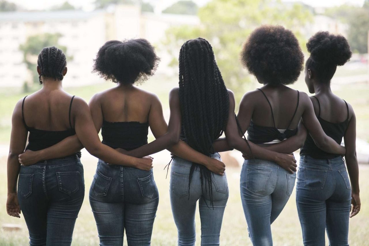 Sorority sisters standing together