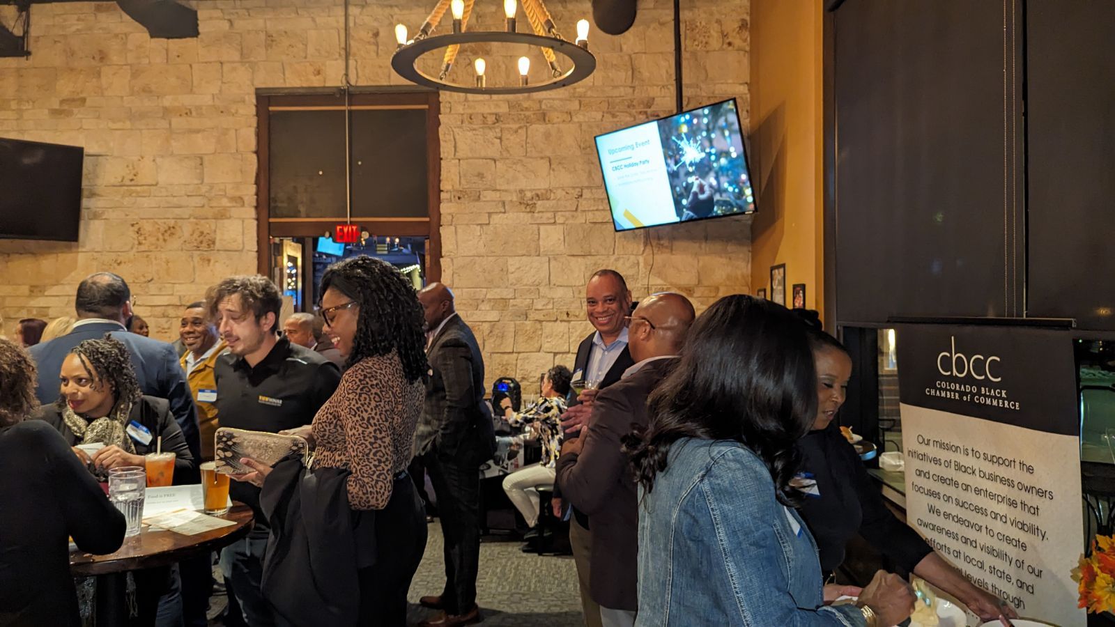Black professionals networking at a business event