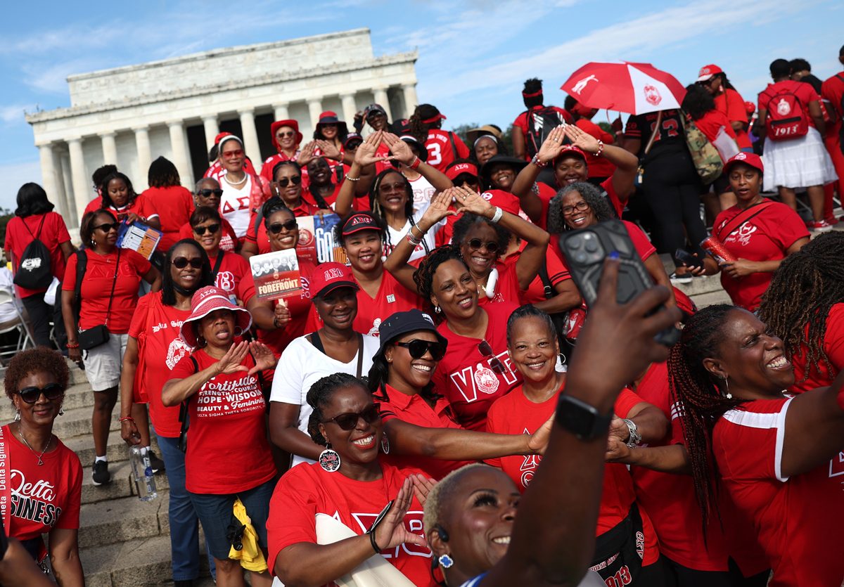 Delta Sigma Theta members in crimson and cream