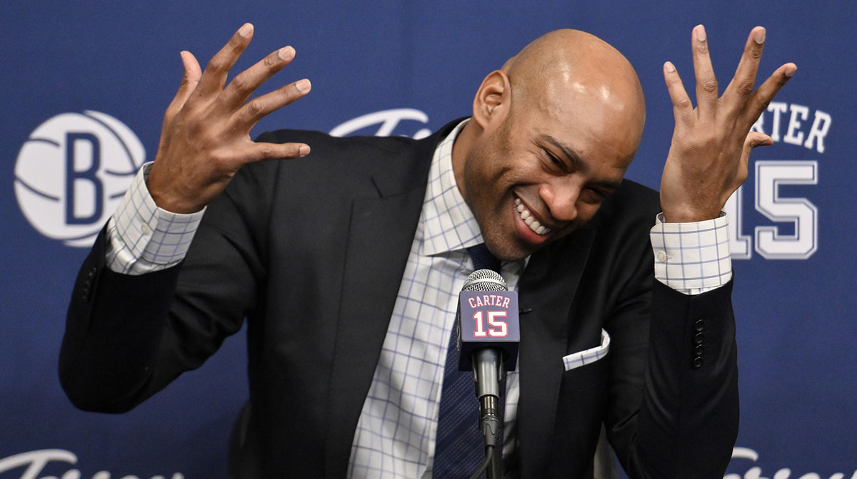 Vince Carter addresses media as a notable Omega Psi Phi member