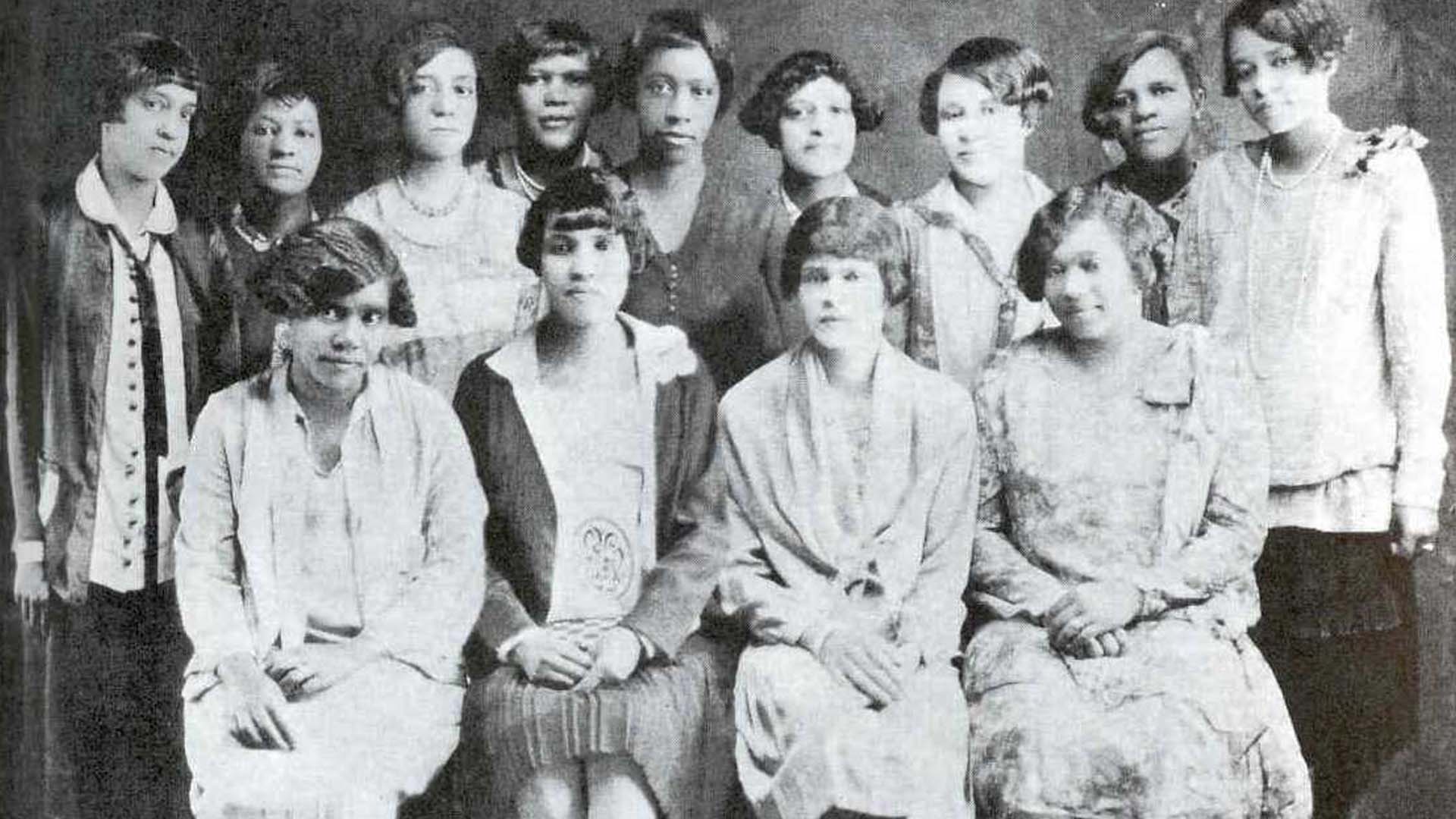 Sigma Gamma Rho sorority members in royal blue and gold