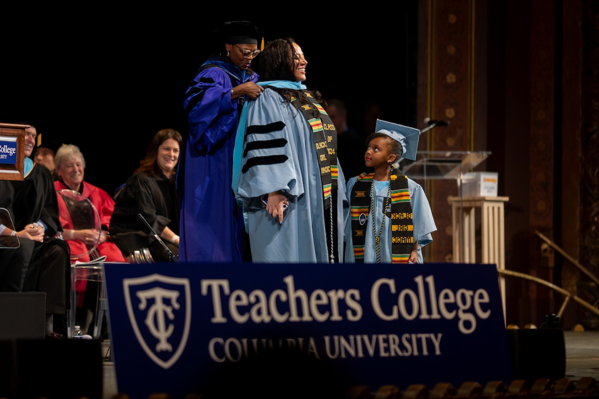 A family celebrating a graduate at commencement
