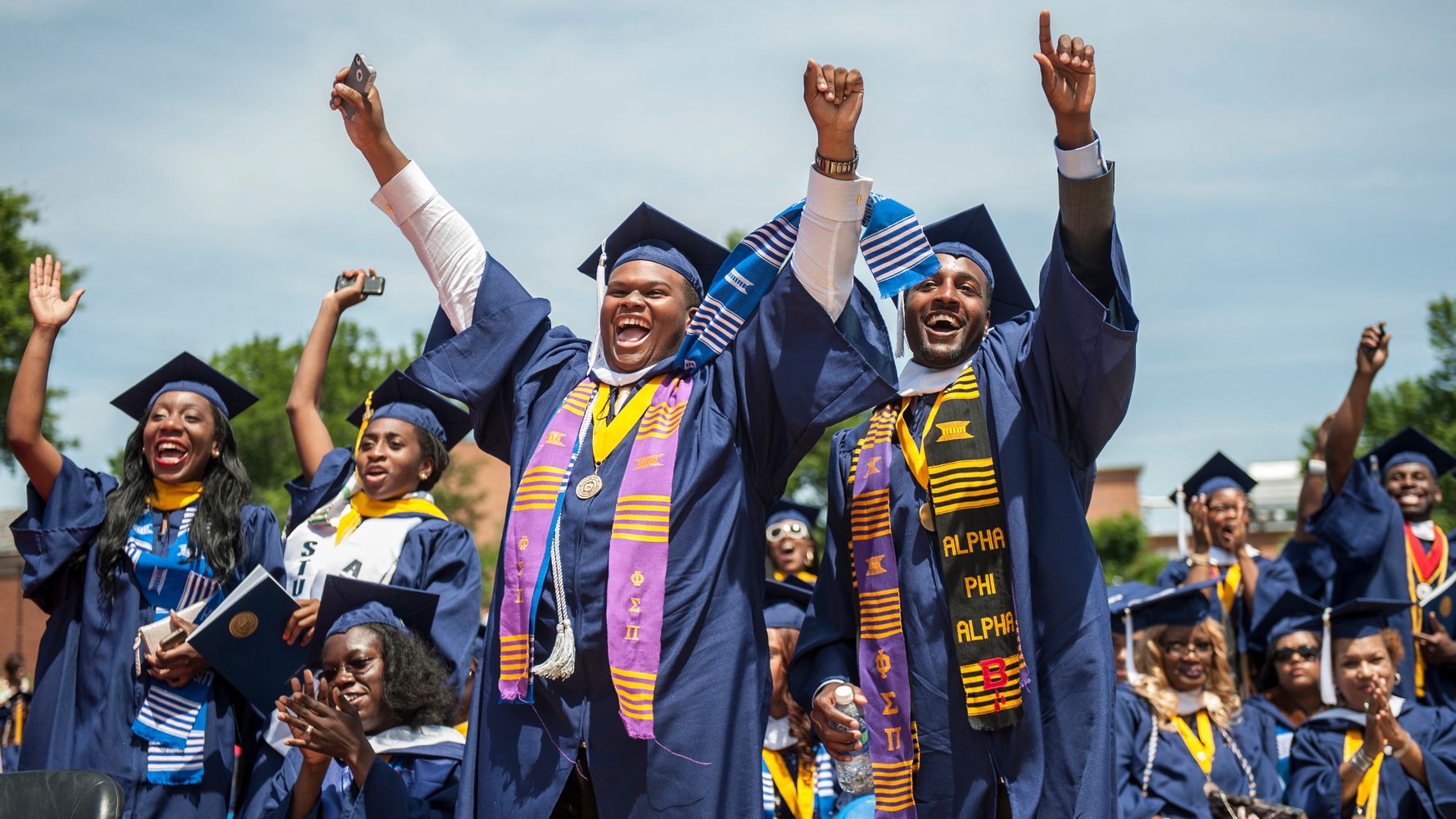 HBCU graduates celebrating at commencement
