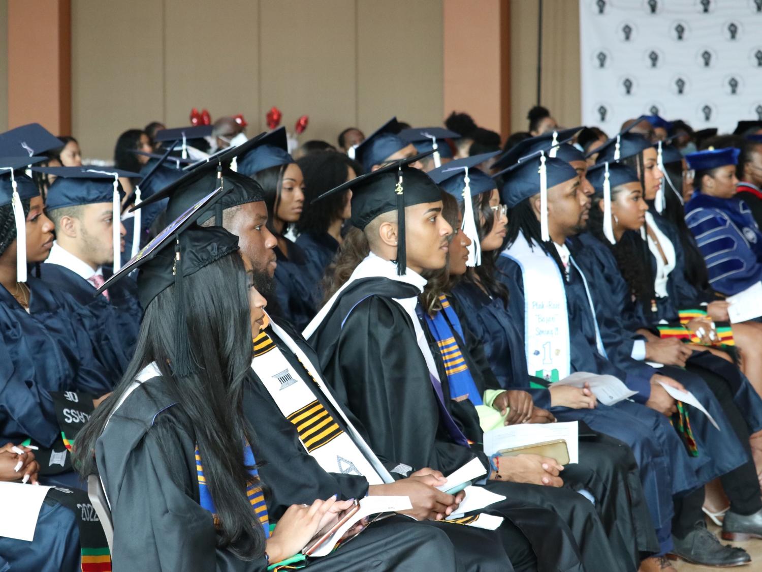 Graduates celebrating together at a commencement ceremony