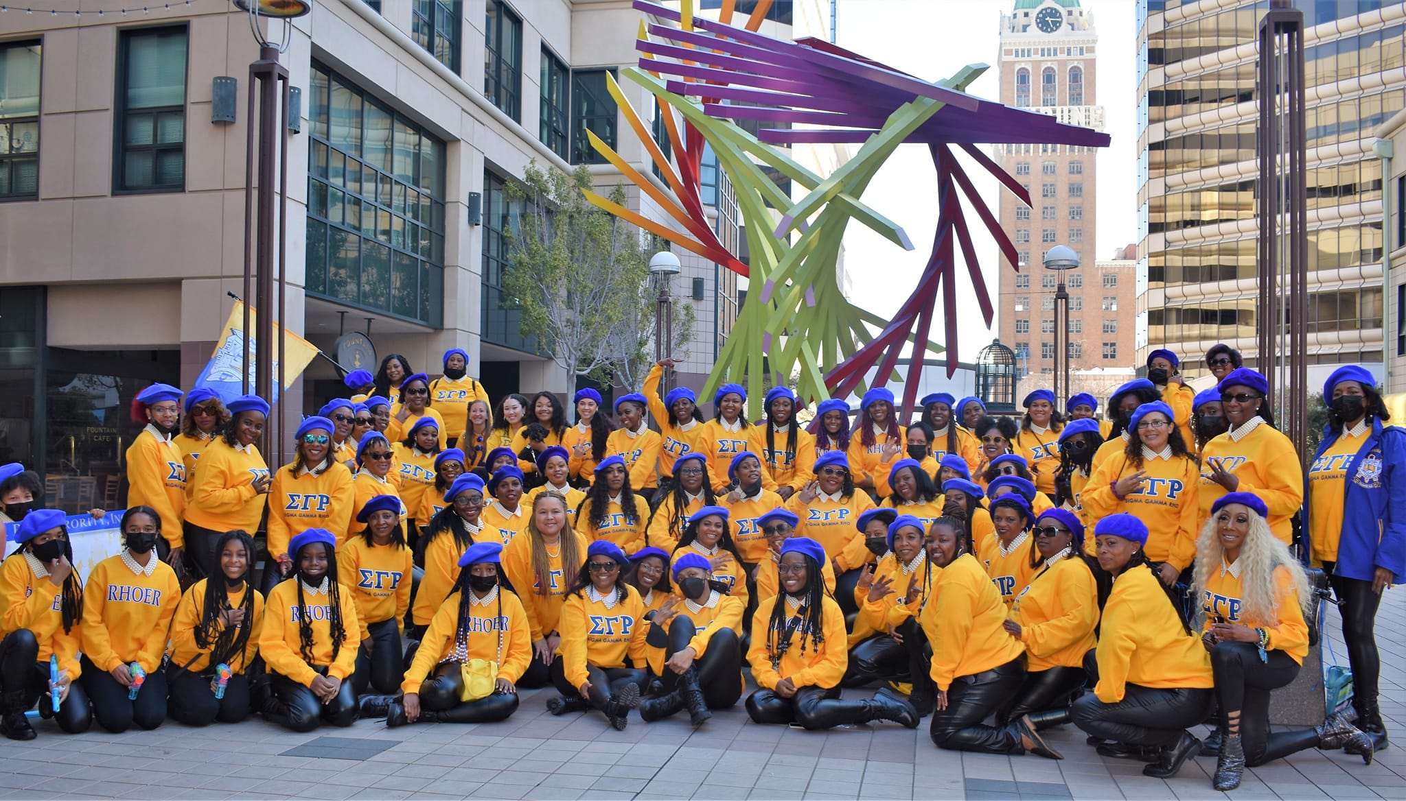 Sigma Gamma Rho members marching in a parade
